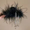 Detail of black feather hair claw clip with elegant rhinestone tassels and crystal beads. - Black Feather Claw Clip with Rhinestone Tassels