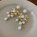 Elegant French vintage gold-toned earrings featuring white pearls and clear crystals - Flower Artificial Pearl Tassel