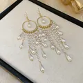 Elegant French retro long pearl tassel drop earrings with a luxurious gold finish. - Ear Hook Artificial Pearl Tassel