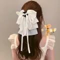 Elegant white chiffon bow hair claw clip with long ribbons for women's hairstyling - No.19 Claw Clip - White Mesh Bow Tassel