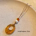 Elegant amber resin geometric hoop pendant necklace sweater chain, length approx. 70cm - 70cm Length / Brown