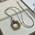 Minimalist resin geometric ring necklace with long adjustable black cord for women - Silver Bead Geometric Ring / Coffee-Silver