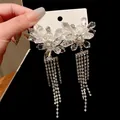 Exaggerated silver needle floral crystal earrings with long sparkling rhinestone fringe tassels - Pearl Center Petal Five-Row Tassel Style (28#)
