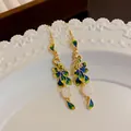 Ethnic style peacock earrings with elegant blue-green enamel and white bead tassel drops - 13# Ear Hook