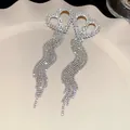 Exquisite sparkling heart-shaped rhinestone long tassel drop earrings with premium silver needles - Hollow Heart Wave Full Rhinestone Tassel Style (58#)
