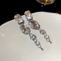Elegant silver tassel earrings featuring clear faceted crystal drops for women's fashion - Geometric Artificial Crystal Linear Tassel Style (72#)