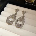 Elegant silver-plated drop earrings with sparkling crystals and delicate leaf motifs - Flower Water Drop Feather Combination Long Style (77#)
