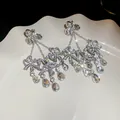 Silver-toned rhinestone bow earrings with teardrop crystal tassels - Bowknot Multi Water Drop Tassel Style (36#)