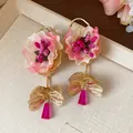 Exquisite detail of fabric floral earrings featuring gold leaves and pink glass pendants - Flower Style (HE30866) / Rose Red
