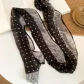 Detailed view of the vintage paisley and polka dot pattern on a soft chiffon fabric belt - 22# Waist Chain - Black