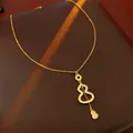 Elegant gold titanium steel necklace featuring a sparkling zircon gourd tassel pendant charm - Style 34#