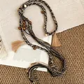 Detail showing the intricate braided fabric, wooden beads, and tassels of this belt - 56# Waist Chain - Colorful Coffee
