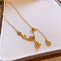 Elegant gold titanium steel necklace with gourd pendant and Fu fortune charms detail view - Style 22#