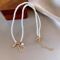 Elegant pearl necklace with gold gourd pendants and zircon accents - Style 36#