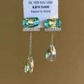 Elegant asymmetric teal and clear glass tassel earrings with 925 silver needle studs - Silver-Green