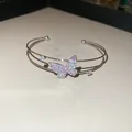 Adjustable silver cuff bracelet with sparkling pink and clear zircon butterfly - Style 42 / Silver
