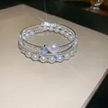 Elegant multi-layer pearl and crystal open bracelet with silver-tone finish and blue accent - Style 48 / Silver