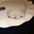 French retro adjustable gold bangle with zircon floral charms and sparkling pavé bar - Style 53 / Gold-Cross