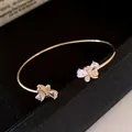 Elegant gold butterfly adjustable open bangle bracelet with sparkling zircon stones - Style 57 / Gold