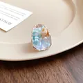 Macro view of French vintage ring featuring beads and conch shell inside an oval frame - French Vintage Beaded Ring (Oval)
