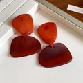 Detail of vintage irregular geometric resin dangle earrings with marbleized orange-brown finish - Silver Post Irregular Geometric Pendant / Brown