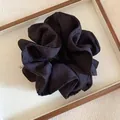 Elegant black pleated fabric scrunchie hair tie for vintage and minimalist styling - Black Checkered