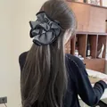 Large black and white gingham ruffled scrunchie for elegant and vintage hair styling. - Black Multi-layer Plaid