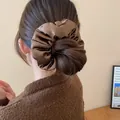 Elegant large brown satin pleated scrunchie hair tie worn on a messy low bun accessory - Coffee Satin
