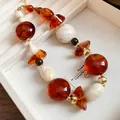 Close-up of irregular amber and marbled resin bead necklace in vintage Maillard style - Coffee & White Style(6#)