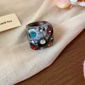 Stylish chunky dark grey wrinkled resin ring inlaid with vibrant colorful rhinestones - Black