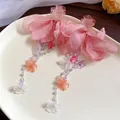 Elegant pink fabric flower earrings with long pearl tassels and resin floral charms. - Pink (84# Silver Post-Pink)