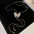 Elegant silver snake chain necklace with a textured double-layer white butterfly pendant - Liquid Metal Double Butterfly Long Chain Style / Silver