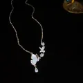 Elegant butterfly pendant necklace with white shell wings and sparkling clear crystals - Shell Splicing Butterfly Teardrop Style / Silver