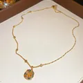 Elegant gold-tone chain necklace featuring a colorful painted square-shaped pendant for women - Square Painted Pendant Style / Colorful Gold