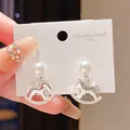 Detail shot of pearl rocking horse earrings with 316L stainless steel display card. - Silver Hammered Pearl Pendant Style (6#)