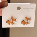 Detailed close-up of brown rocking horse stud earrings with rhinestones on a white display card - Silver Warm Brown Rocking Horse (36#)