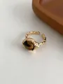 Anello aperto placcato oro 18k con montatura testurizzata e cabochon occhio di tigre - Stile 7 / Oro E Caffè