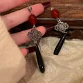 Elegant vintage Chinese knot drop earrings with red beads and black teardrop pendants - Antique Silver Needle