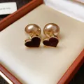 Close-up of elegant flocked burgundy heart earrings with pearl backings in a gift box. - Flocked Heart Style (HE29818) / Coffee