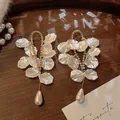 Detailed close-up of elegant French vintage style shell petal earrings with drop pearl - Water Drop Shell Petal Style (2# Silver Post)