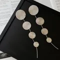 Geometric silver tiered drop earrings with textured round discs for women. - Four-Disc Tassel (10#) / Silver