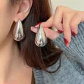 Boucles d'oreilles clip goutte d'eau en métal argenté minimaliste avec fini poli - Tige en Argent Régulière (42#)