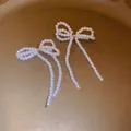 Elegant French retro white pearl bow earrings with long dangling strands for women - Woven Pearl Bowknot Style (15# Silver Post)