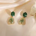 Elegant gold-tone geometric drop earrings with green stones on luxurious silk fabric - 55# Silver Needle - Geometric