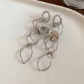 Trendy silver hollow geometric tassel drop earrings for women fashion jewelry style. - Geometric Hollow Tassel (46#) / Silver