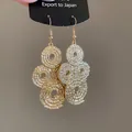 Fashionable gold-toned round hollow textured coil earrings featuring hypoallergenic silver needles - Round Hollow Ear Hook (43#) / Gold