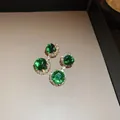Elegant golden drop earrings featuring round green gemstones with shimmering zircon accents - 70# Silver Needle - Circle
