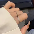 Elegant silver-tone wavy and twisted zircon stackable rings for women worn on finger - Wave Twist Stacking Style