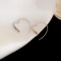 Elegant silver heart-shaped hoop earrings presented on a luxurious white silk background - Minimalist Heart Ear Hook (78#) / Silver