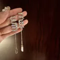 Elegant silver finish metal long tassel drop earrings encrusted with sparkling rhinestones - Letter Style / 925 Silver Needle / Silver